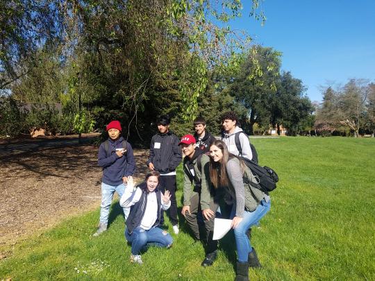 Students posing for a fun photo during discovery day