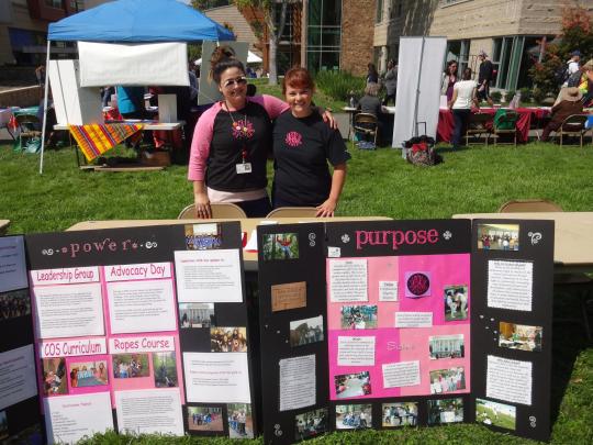 Mira Fielding and Circle of Sisters colleague tabling at the 2014 Service & Internship Fair.