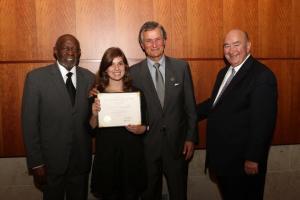 Natalie Hambalek shows off her award