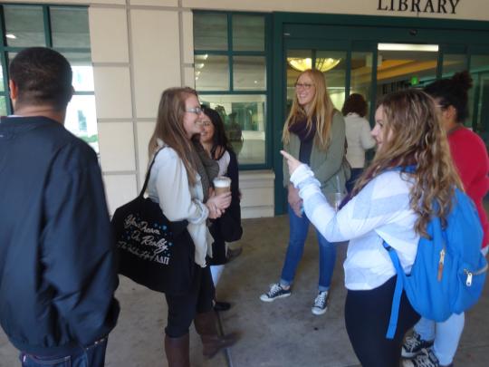 Shadow Day group debriefing after their tour of the library.