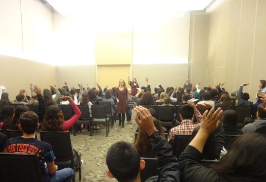 RUP students raising their hands after the CCE Coordinator Merith Weisman asks, "Who wants to go to college?"