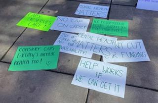 Demonstration signs supporting student mental health